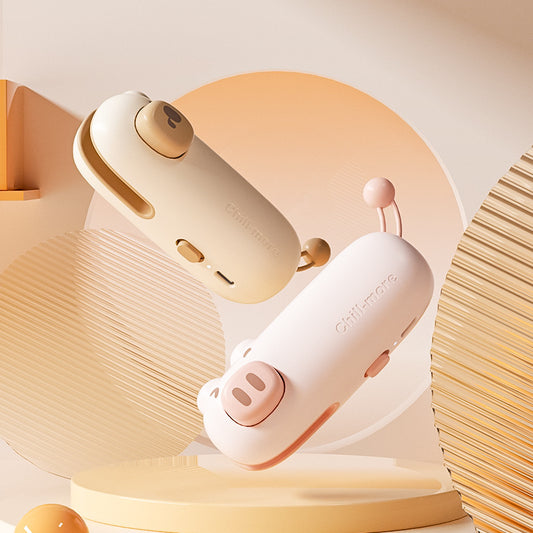Mini handheld bag sealer in Pink Pig colour